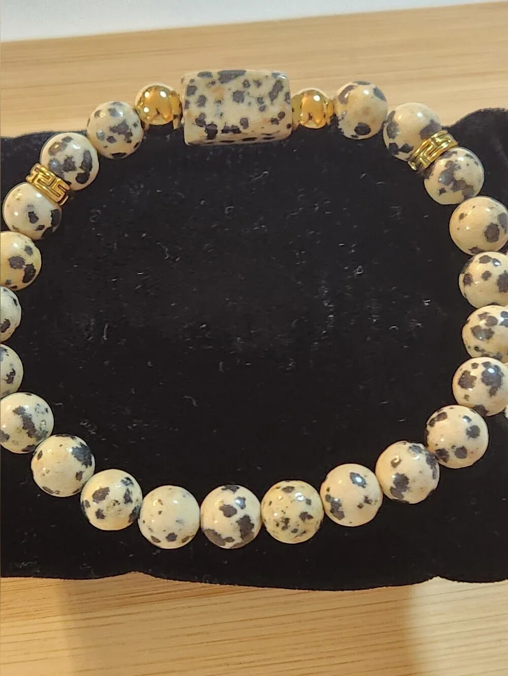 Hand Crafted Dalmatian Jasper Stretch Bracelet With Gold Accents Black Beige